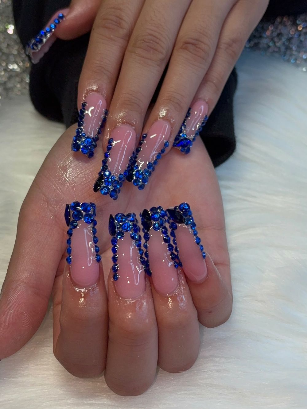 Long blue rhinestone French tips