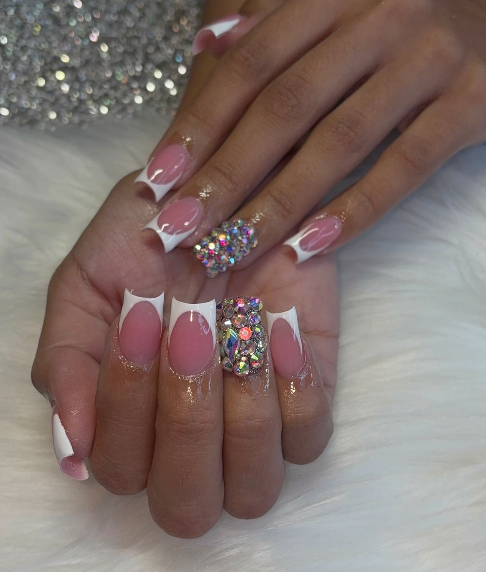 White French set with a crystal accent nail